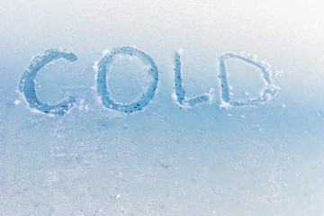 Text cold on the frozen glass - 189465358