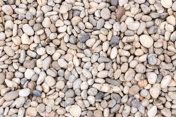 Stone pebbles texture or stone pebbles background. stone pebbles for interior exterior decoration design business and industrial construction concept design. Stone pebbles motifs that occurs natural.