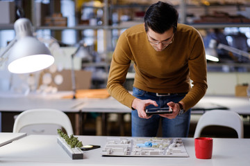 Man working in design and engineering architecture office