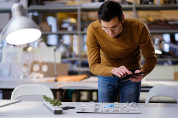 Man working in design and engineering architecture office