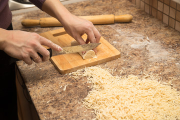 Preparation of home-made noodles in the kitchen