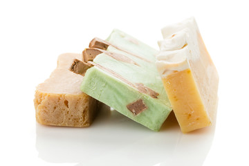 Bars of natural organic soap isolated on white