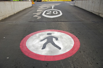 Road signs on asphalt