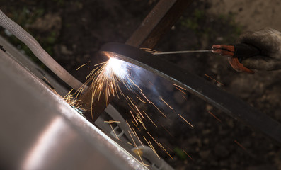 Sparks from welding at the construction site