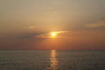Naklejka na ściany i meble sea summer sun sunset evening