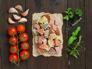 Tricolor fir tree shaped pasta, vegetables and herbs