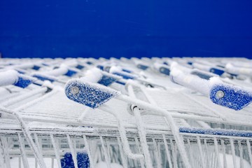 parking for shopping trolley in the snow. Frozen market 3