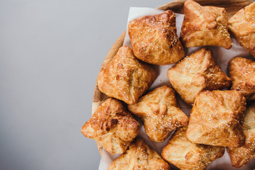 Crispy cheese puff pastries with seeds. Top view with copy space for text or advertising