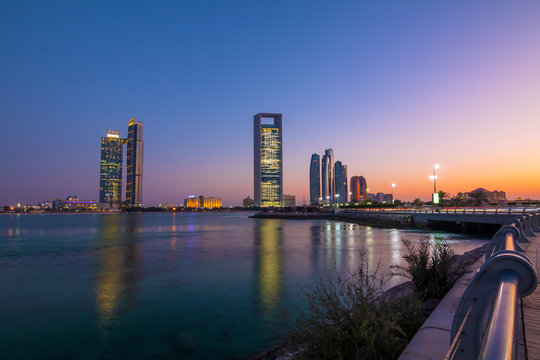 View of Abu Dhabi Skyline at sunset, United Arab Emirates