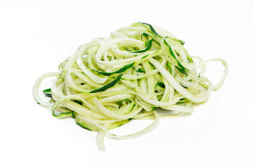 Raw ucchini noodles in a stack isolated