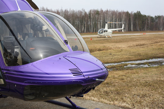 Aircraft - Purple and small white helicopters
