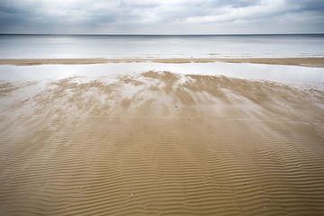 Landscape with Jurmala's sand beach in Riga's Bay, Baltic Sea, Latvia.