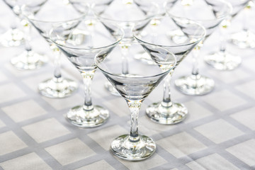 Banquet table there are empty glasses for brandy