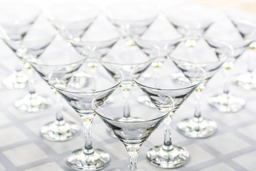 Banquet table there are empty glasses for brandy