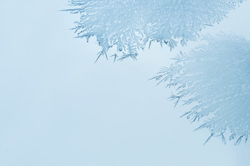 Winter background, ice on window. Frosted glass. Patterns made by the frost on the window