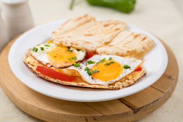 Sunny side up egg sandwich with Pita Bread