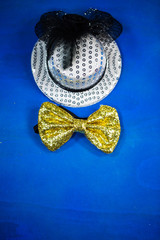 hat and bow tie, blue background, party, carnival, New Year's Eve