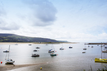 Barmouth harbour with view towards Snowdonia in Gwynedd North Wales UK