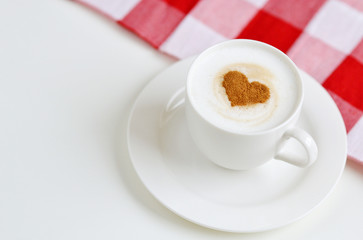 Cappuccino with heart pattern of cinnamon, Valentines Day