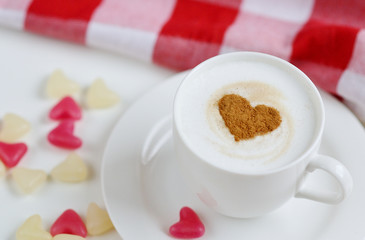 Cappuccino with heart pattern of cinnamon, Valentines Day