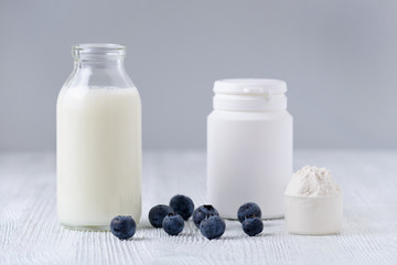 milk products and blueberrys on the table