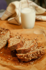 Homemade fresh baked bread with glass of milk
