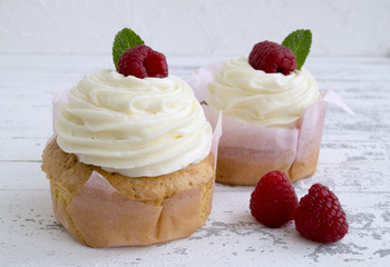 Homemade cake with sweet cream and berries.
