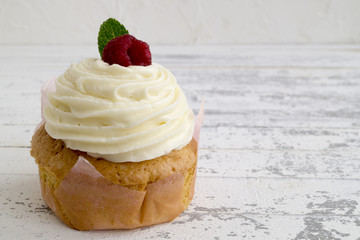 Homemade cake with sweet cream and berries.