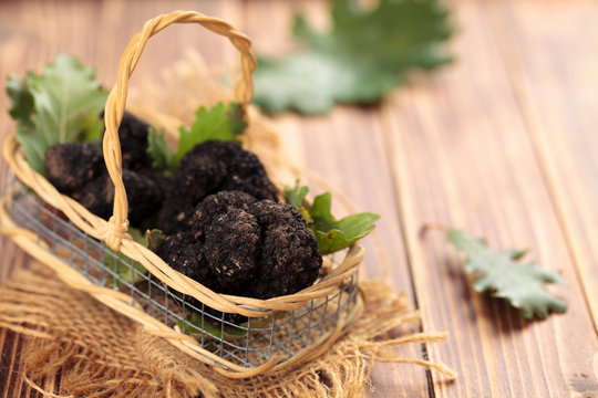 Black truffles in basket.