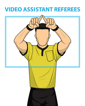 Football referee shows video assistant referees action.