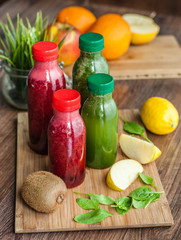 colorful fruit smoothie in bottles