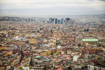 Fototapeta na wymiar Naples, Italy - November 30 2017: Panoramic view of the italian city by Vesuvius