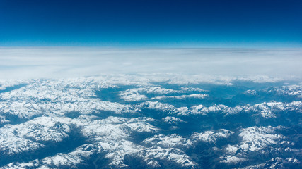 Naklejka na ściany i meble Landscape of Mountain. view from the airplane window