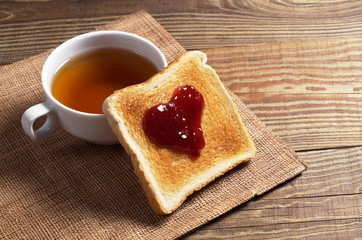 Toasted bread with jam and tea