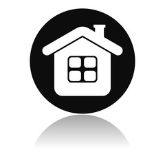 Home icon. Round black icon of a resedential house