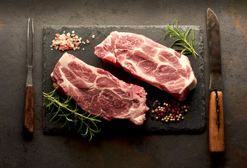 Meat on the black stone with  rosemary pepper and salt 