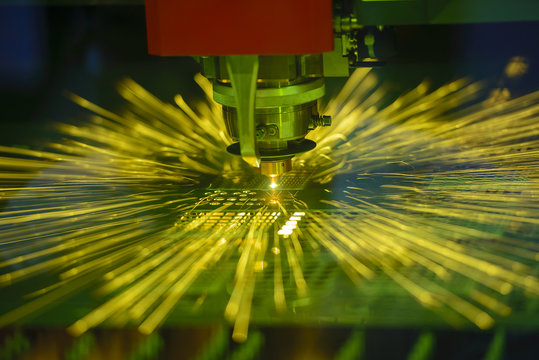 The fiber laser cutting machine controller by CNC program.The sheet metal cutting process by CNC fiber laser cutting.
