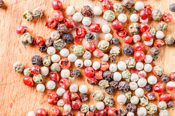 pepper mix on a wooden background