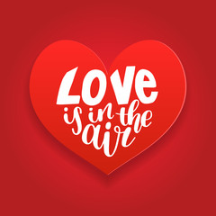 Vector hand lettering phrase Love Is In The Air. February 14 calligraphy in heart shape. Valentines day typography