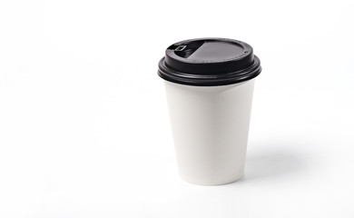 Isolate of a paper cup for coffee with a dark lid