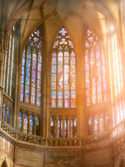 Stained glass windows at St Vitus Cathedral interior in the old town of Prague.