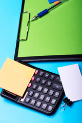 Business accessories concept. Stationery and calculator