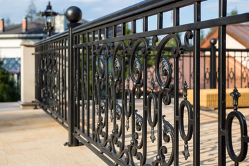 Decorative, forged banisters, fence in old style