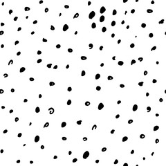 Seamless pattern with hand drawn black dots on white background. Polka texture. Vector illustration.