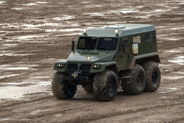 All-terrain military truck at the battle field