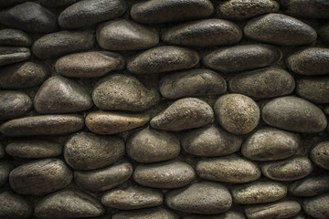 A unique wall texture using natural rounded stone.