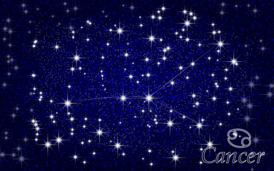 Constellation of Cancer in a starry blue sky