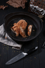 Top view of home strudel with chicken in frying pan