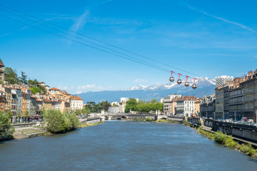 Grenoble-Bastille cable car, four bubbles on sling, transport to hill and fortress of Bastille cross Isere river in Grenoble, France © jeafish