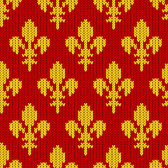 Fleur-de-lis on a seamless vector woolen pattern. Knitted woolen pattern with Heraldic lilies. Golden royal lilies on red